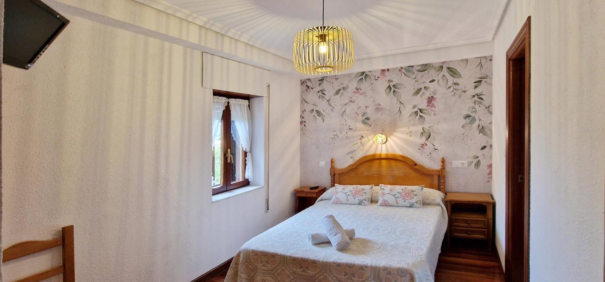 Hotel Cosma House Hinojedo Pokoj fotografie